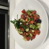 Shepherd Salad · Fresh tomatoes, cucumber, green pepper, parsley, dill and onion mixed in red vinegar and oli...