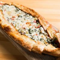 Ispanakli Pide( Spinach pide ) · Spinach pide. A thick dough crust stuffed with spinach and mozzarella cheese.
