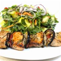Salmon Shish · Chunks of North Atlantic salmon char-grilled. Served with mixed green salad.