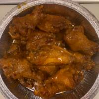 Buffalo Wings  · 12 Pieces. Choice of BBQ, hot, buffalo, or extreme.