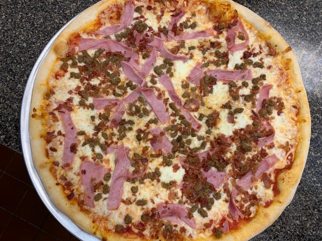 Pizza Plus Meat Lovers Pizza Specialty · Ham, bacon and sausage.