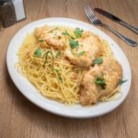 Chicken Francese Pasta · A golden crust of Parmesan and eggs presented in a zesty sauce of lemon and white wine. 