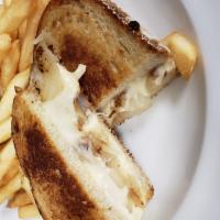 French Onion GrillCheese · Mozzarella and sauteed onions. Served with fries.