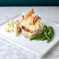 Stuffed Chicken Breast · Garlic mashed potatoes and green beans.
