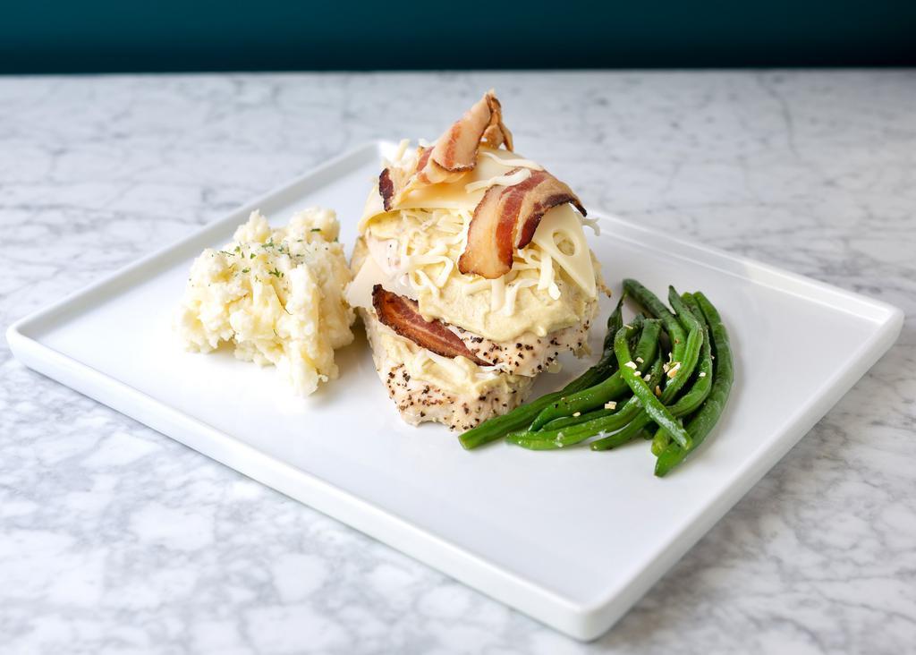Stuffed Chicken Breast · Garlic mashed potatoes and green beans.