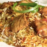 Chicken Biryani · Boneless chicken cooked with basmati rice and mild spices.