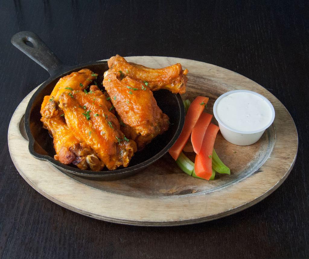 Wings ·  Wings Smoked In House. Served With Carrots, Celery and Blue Cheese Dressing. Come With Your Choice Of Sauce: Cajun Dry Rub, Mild Buffalo, Honey BBQ, Spicy Bourbon Maple Glaze or Spicy Habanero.