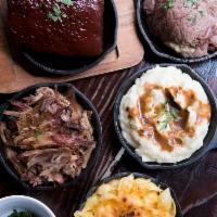 BBQ Tasting Platter · 1/2 Rack Ribs, 6 oz. of Brisket, and 6 oz. Pork Served With Any 2 Sides.