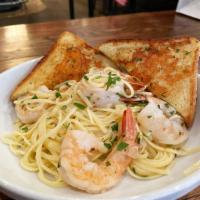 Shrimp Scampi  · Shrimp Sauteed With Garlic Butter Over A Bed of Linguine Served With Texas Toast.