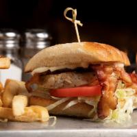 Grilled Chicken Club Sandwich · Juicy Grilled Chicken Served With Lettuce, Tomato, Bacon, and Mayo.