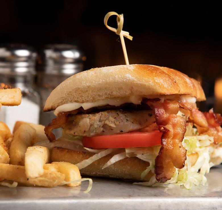 Grilled Chicken Club Sandwich · Juicy Grilled Chicken Served With Lettuce, Tomato, Bacon, and Mayo.