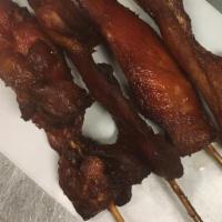 Chicken on the Stick（鸡串） · Four pieces.