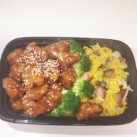 C11. Sesame Chicken Combination 芝麻鸡 · Served with roast pork fried rice and an egg roll.