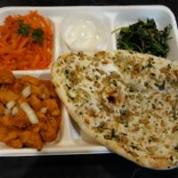 Naan platter · Naan served with your choice of 2 entrees and 2 sides