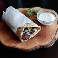 Lamb Pepper Wrap · Indian spiced lamb cooked with onions, black pepper, and garlic, served with cumin yogurt sa...