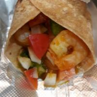 Masala Shrimp Wrap · Indian style shrimp stir-fried with Masalas, Bell Pepper, Onions, Tomatoes and Coriander. 