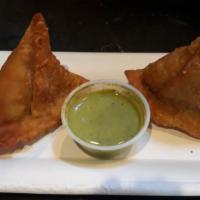 2 big samosa · Indian fried dumpling with potatoes and peas. Select vegan or yogurt mint chutney