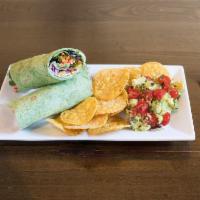 Veggie Wrap · Spinach wrap filled with sliced bell peppers, mixed greens, red cabbage, shredded carrots an...
