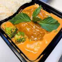 12. Kin Aroy Curry · Choice of protein, broccoli, carrots, bell peppers, peas, carrots, peanut sauce, red curry b...