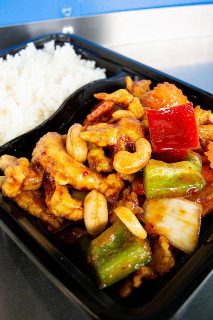 21. Pad Cashew Nut Stir Fry · Choice of protein, cashew nuts, carrots, mushroom, onions, bell peppers.