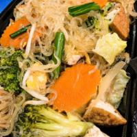 41. Pad Woon Sen Noodles · Bean thread noodles, choice of protein, egg, broccoli, carrots, green onions, cabbage.
