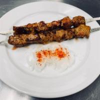 Lamb Shashlik · 1 skewer. Marinated lamb loin charcoal-grilled on skewer and served with marinated onions. S...