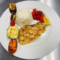 Sea-Bass  · Chilean sea-bass seasoned, marinated & grilled. Served with rice pilaf and tomatoes. 