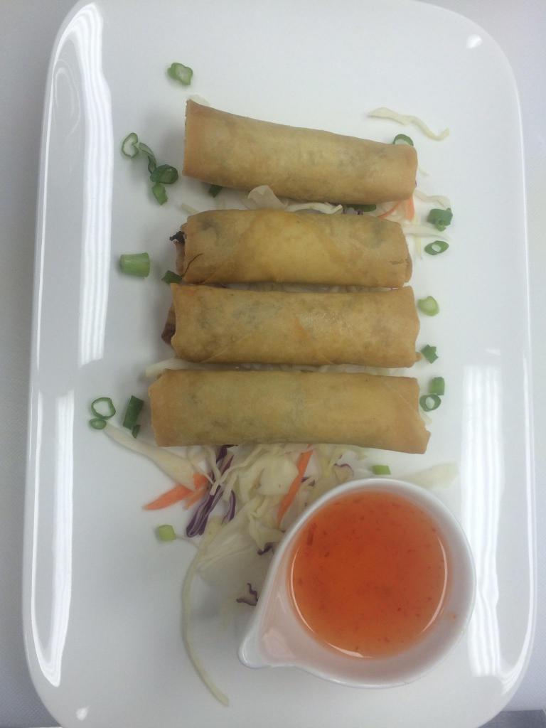  Veggie Spring Roll · Crispy rolls with cabbage, dried mushrooms, carrots, onions, celery and glass noodles served with a sweet and sour sauce.