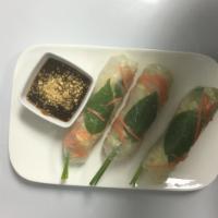 Summer Roll · Lettuce, cucumbers, carrots, vermicelli noodles, basil leaves and chives wrapped in clear ri...