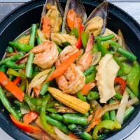  Lemon Grass Seafood Lover Stir-Fry · Sauteed seafood in spicy basil sauce with lemongrass, basil, onions, garlic, green pepper co...