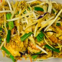  Singapore Noodles · Sauteed rice noodles, egg, vegetables and Yellow curry powder.