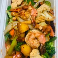 Pad Cashew Stir-Fry · Cashews, broccoli, carrots, peppers, onion, mushrooms, scallions, tomatoes and pineapple wit...