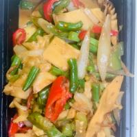 Thai Pad Ped Stir-Fry · Green pepper, corn, onions, bamboo and green bean, in coconut sauce.