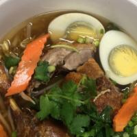 Duck Pho Soup · Bean sprouts , carrots, scallions, bok choy (Chinese cabbage) hard broiled egg in a duck fla...