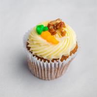 Carrot Cake · Carrot-pecan cake with cream cheese frosting and crushed pecans on top