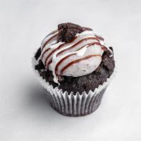 Cookies N' Cream Cupcake · Chocolate cake frosted with Oreos buttercream and topped with crushed Oreos.