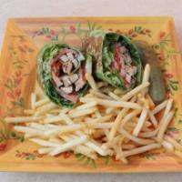 Grilled Chicken Caesar Wrap · Grilled chicken, roasted peppers, lettuce, tomato and Caesar dressing.