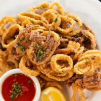 East Coast Calamari · Fresh calamari lightly coated with seasoned flour and fried to a crisp golden brown. Served ...