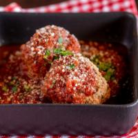 Russo's Homemade Meatballs · Two large beef and veal homemade Italian-style meatballs in Russo’s chianti-braised meat sau...
