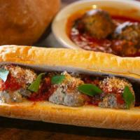 Meatball Parmesan · Homemade beef and veal Italian meatballs, Russo's Chianti-braised meat sauce, and Wisconsin ...