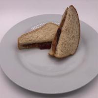 Peanut butter and Jelly Sandwich · Crunchy Peanut butter and Strawberry Jelly on Golden Wheat
