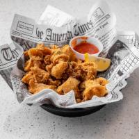 Fried Calamari · lightly fried and breaded served with marinara sauce