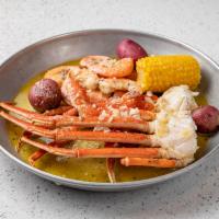 Combo D · 1 lb snow crab, 1/2 lb shrimps no heaad, 1 corn and 2 potatoes.