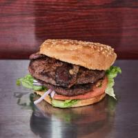 B8. Broadway Organic Burger · 100% beef double burger with bacon, Swiss cheese and mayo.