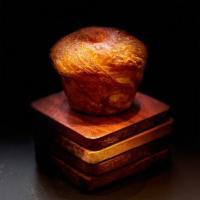 Megg · Muffin shaped croissant with a  baked egg inside.