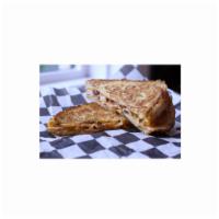 Turkey Trot Sandwich · Smoked sliced turkey, crispy bacon, house-made slob sauce and melted sharp cheddar cheese gr...