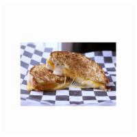 Extra Cheesy Classic Sandwich · Melted Swiss, sharp cheddar, mozzarella and creamy havariti cheese grilled on sourdough bread.