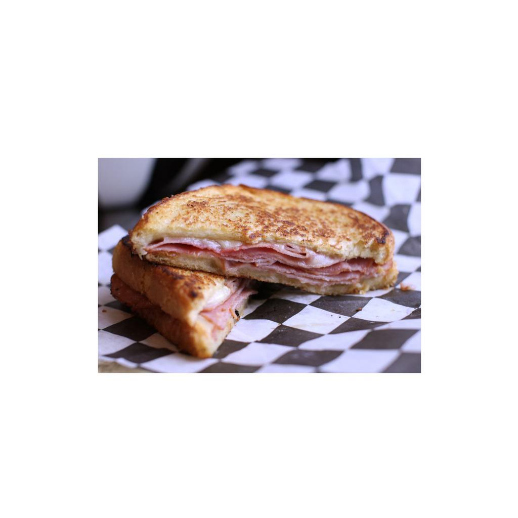 Ham and I Sandwich · Hardwood smoked sliced ham and melted Swiss cheese grilled on sourdough bread.