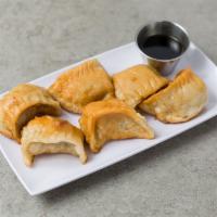 P1. Fried Dumplings Party Tray · 50 pieces. Choice of vegetable, pork or chicken.