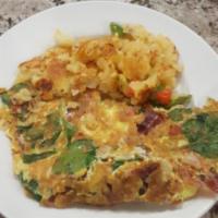 Farmer's Omelette (Veggie) · Fresh spinach leaves, plum tomatoes, onions and fresh mushrooms. Served with potatoes and ch...